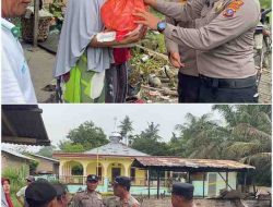 Kapolsek Indrapura AKP Reynold Silalahi Berikan Bantuan Sembako kepada Korban Kebakaran di Laut Tador