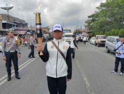 Polres Simalungun Kawal Lancar Kirab Api PON XXI Tahun 2024 Aceh-Sumut