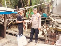 Polsek Medang Deras Gelar Jumat Berkah: Bagikan Nasi Bungkus dan Ajak Masyarakat Jaga Kamtibmas Jelang Pilkada