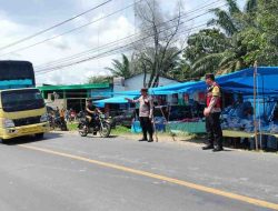 Unit Samapta Polsek Sei Kanan Gelar Patroli Jalan Kaki di Pasar Tradisional untuk Antisipasi Gangguan Kamtibmas