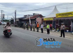 Pengaturan Lalu Lintas di Pospam I Simpang Empat Tanah Merah Berjalan Lancar