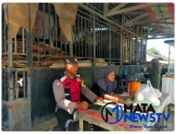 Personel Polsek Medang Deras Gelar Cooling System Pasca Pilkada 2024 di Desa Pakam Raya