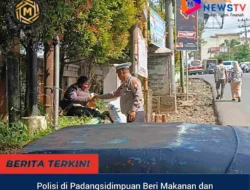 Polisi di Padangsidimpuan Beri Makanan dan Minuman kepada ODGJ di Tengah Tugas Pengaturan Lalu Lintas