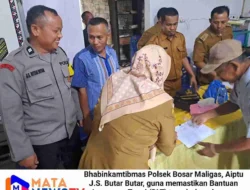 Bhabinkamtibmas Polsek Bosar Maligas Kawal Penyaluran BLT di Simalungun