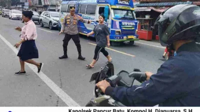 Polsek Pancur Batu Laksanakan Pengaturan Lalu Lintas di Depan Pasar Pancur Batu
