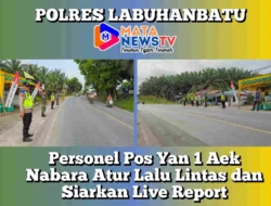 Personel Pos Yan 1 Aek Nabara Atur Lalu Lintas dan Siarkan Live Report