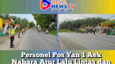 Personel Pos Yan 1 Aek Nabara Atur Lalu Lintas dan Siarkan Live Report
