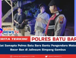 Sat Samapta Polres Batu Bara Bantu Pengendara Motor Bocor Ban di Jalinsum Simpang Gambus