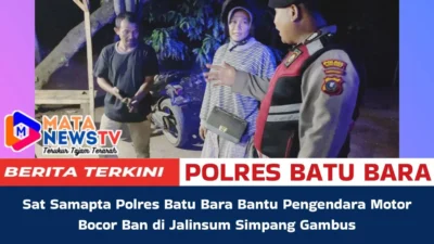 Sat Samapta Polres Batu Bara Bantu Pengendara Motor Bocor Ban di Jalinsum Simpang Gambus