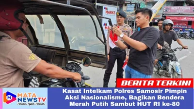 Kasat Intelkam Polres Samosir Pimpin Aksi Nasionalisme, Bagikan Bendera Merah Putih Sambut HUT RI ke-80