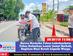 Satres Narkoba Polres Labuhanbatu Tebar Kebaikan Lewat Jumat Berkah, Bagikan Nasi Kotak kepada Warga