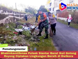 Bhabinkamtibmas Polsek Siantar Barat Ikut Gotong Royong Ciptakan Lingkungan Bersih di Dwikora