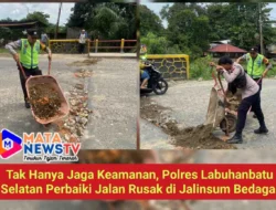 Tak Hanya Jaga Keamanan, Polres Labuhanbatu Selatan Perbaiki Jalan Rusak di Jalinsum Bedagai