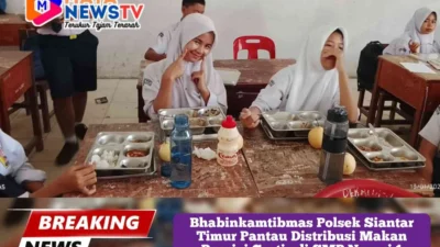 Bhabinkamtibmas Polsek Siantar Timur Pantau Distribusi Makan Bergizi Gratis di SMP Negeri 1