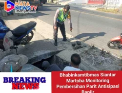 Bhabinkamtibmas Siantar Martoba Monitoring Pembersihan Parit Antisipasi Banjir