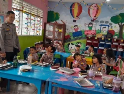 Bhabinkamtibmas Polsek Siantar Timur Monitoring Distribusi MBG di TK Kemala Bhayangkari 06