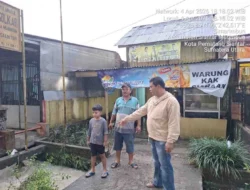 Respons Cepat Bhabinkamtibmas Tangani Banjir di Simarimbun