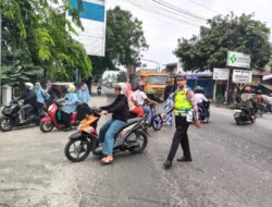 Satlantas Polres Batu Bara Gelar Pengaturan Lalu Lintas Pagi di Jalinsum Simpang Ampat