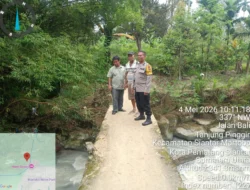 Bhabinkamtibmas Polsek Siantar Martoba Pantau Survei Proyek Jembatan di Jalan Rindung