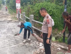 Polsek Hamparan Perak Kawal Pembangunan Jembatan Merah Putih Presisi di Klambir V Kebun