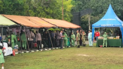 Bazar Murah HUT ke-81 TNI Digelar di Makodim 0317/TBK, Warga Antusias Ikuti Layanan Kesehatan